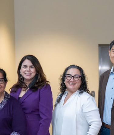 Professors and staff at science event